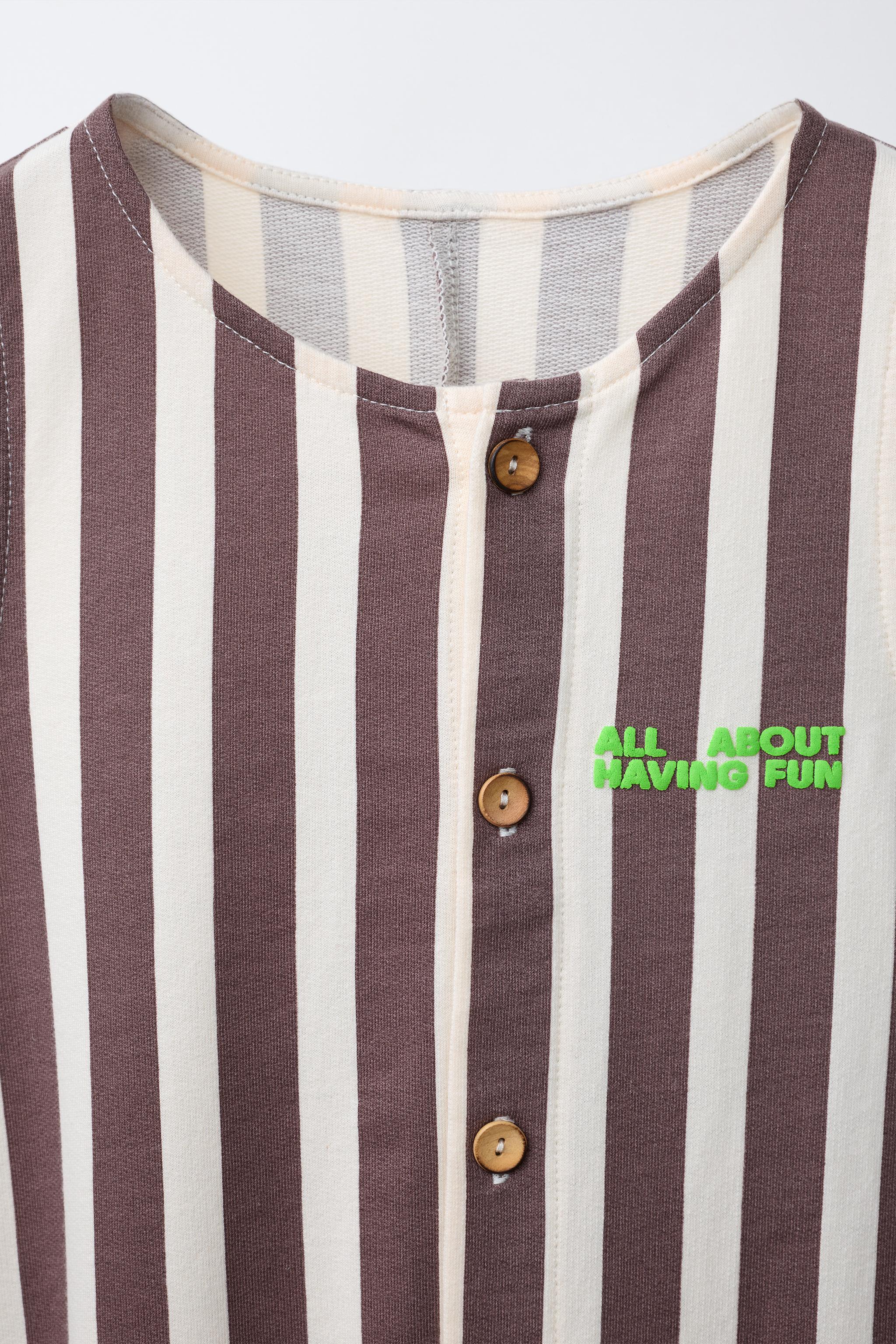 LONG STRIPED OVERALLS WITH EMBOSSED TEXT
